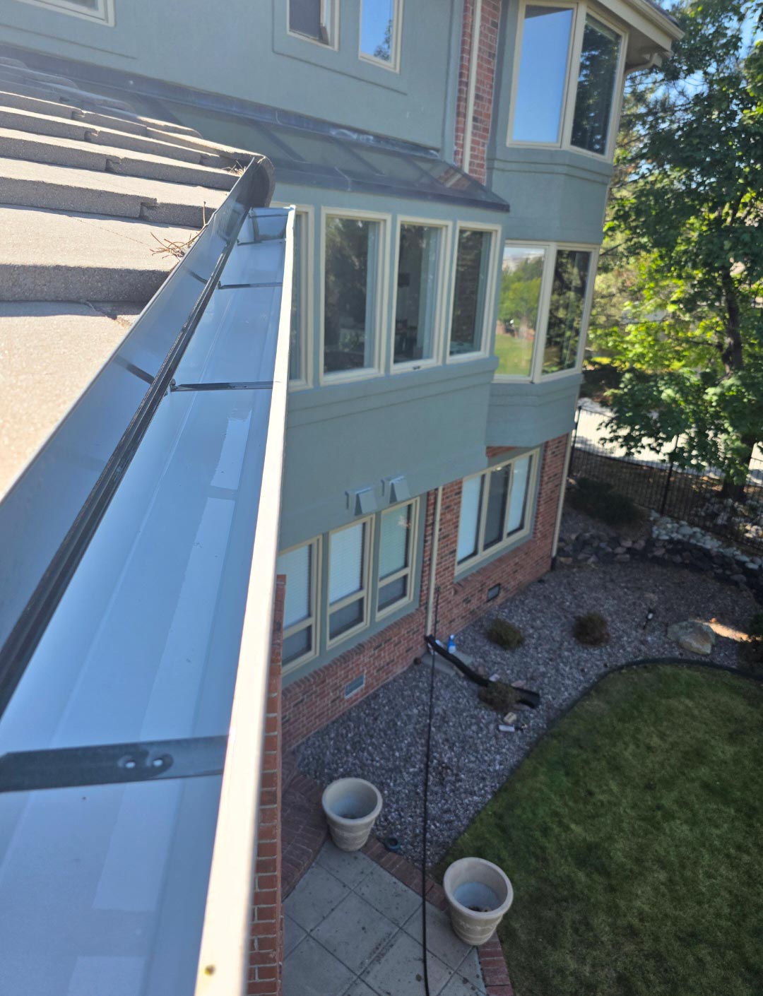 Gutter before cleaning project in Aurora